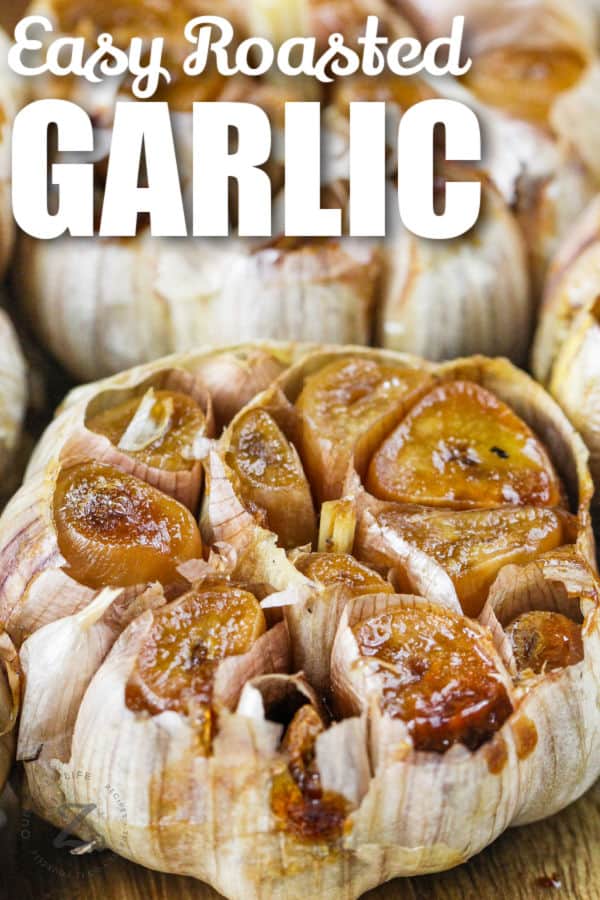 close up of cooked Roasted Garlic with writing