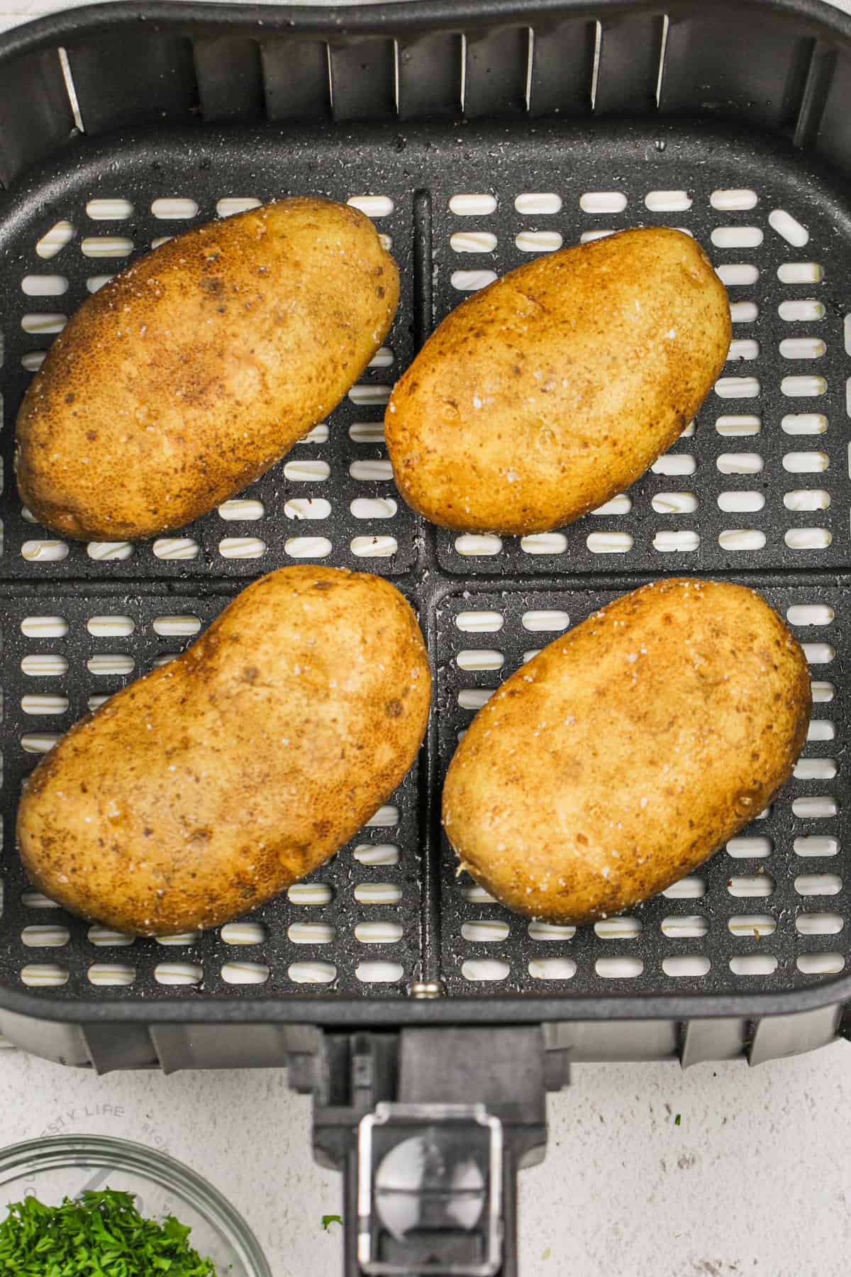 potatoes in the air fryer to make Air Fryer Baked Potatoes