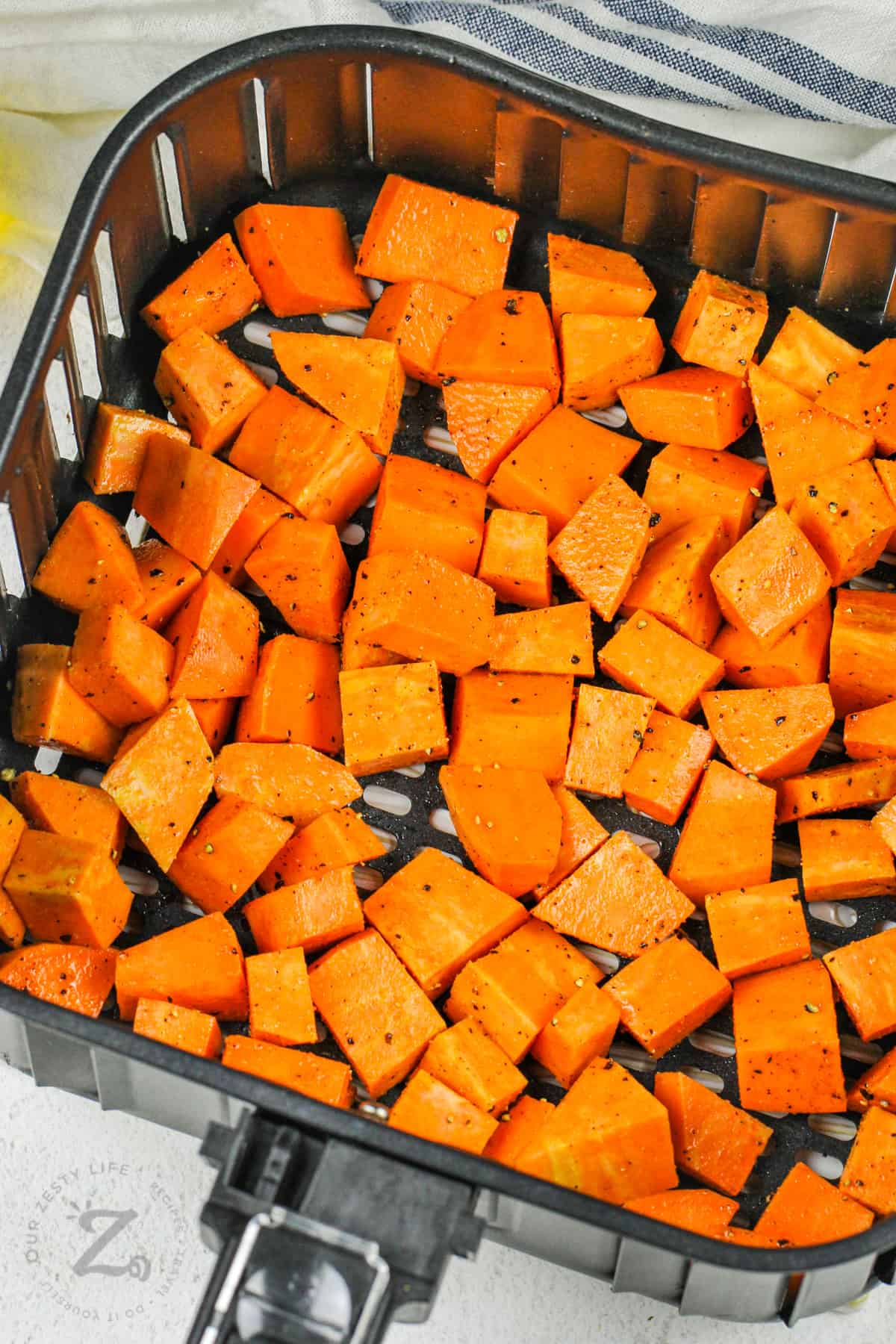 Air Fryer Roasted Sweet Potatoes in the fryer before cooking