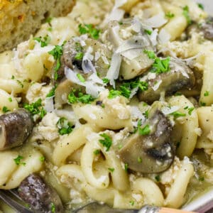 plated Instant Pot Chicken and Mushroom Pasta with garlic toast