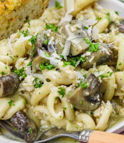 plated Instant Pot Chicken and Mushroom Pasta with garlic toast