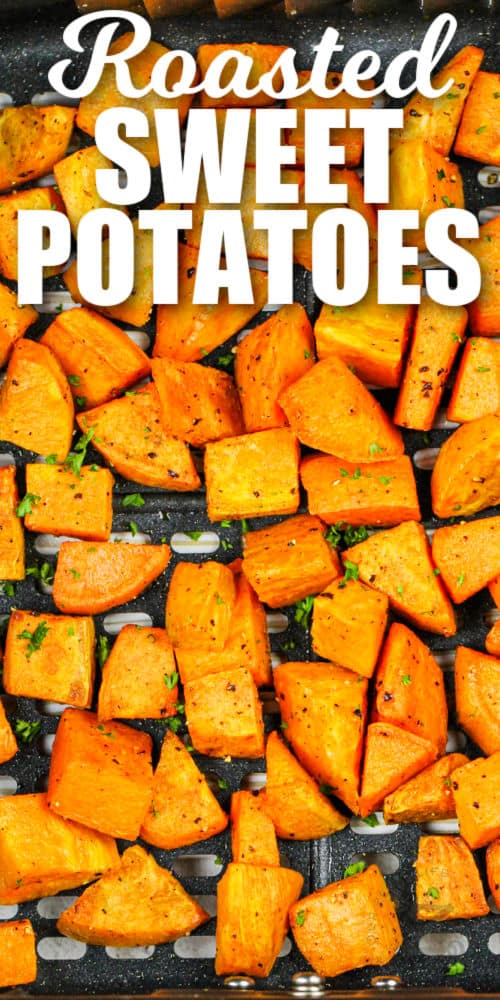 cooked Air Fryer Roasted Sweet Potatoes in the fryer with a title