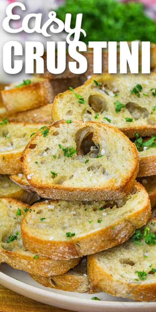 baked Crostini on a plate with writing