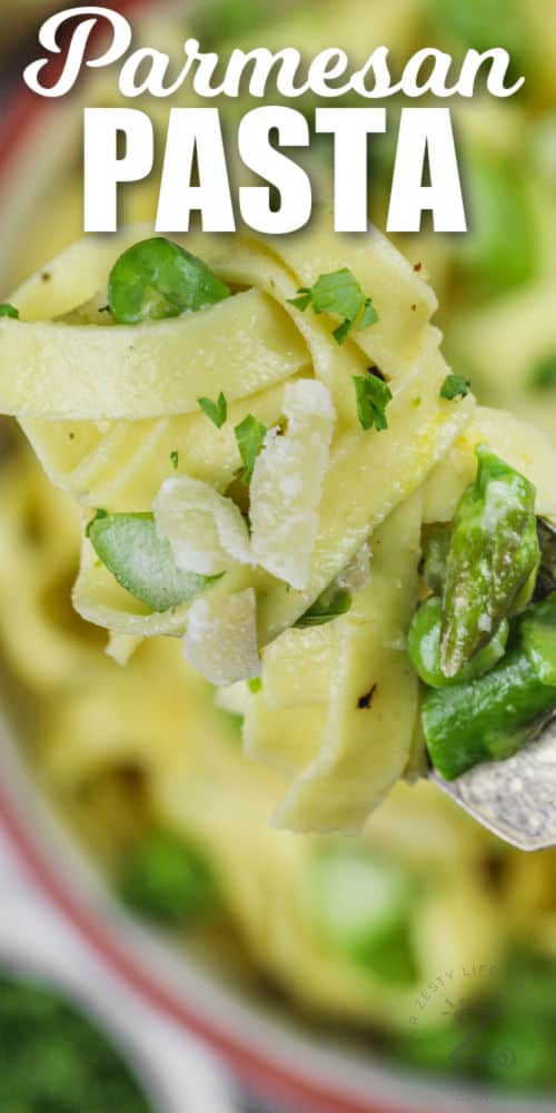 Parmesan Asparagus Pasta on a fork, with writing