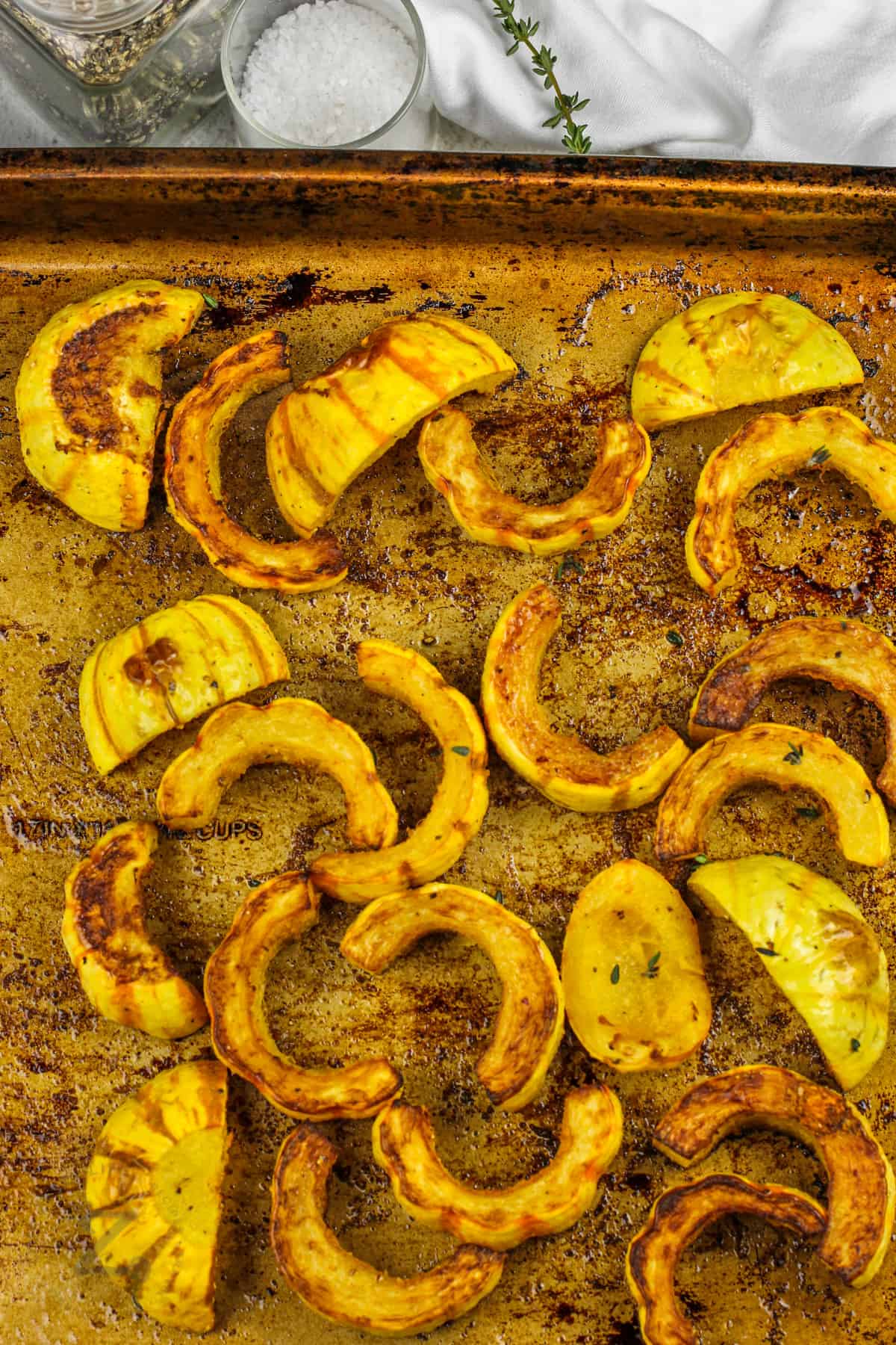 Roasted Delicata Squash cooked on a baking sheet