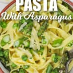 close up of Parmesan Asparagus Pasta with forks and writing