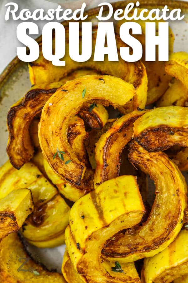 top view of Roasted Delicata Squash on a plate with writing