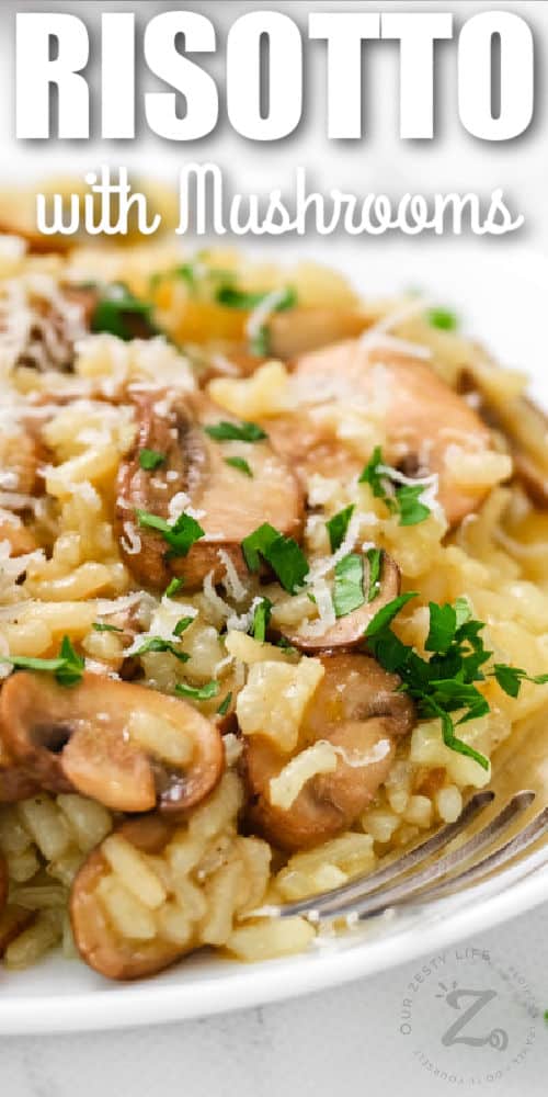 Risotto with Mushrooms on a plate with a fork with a title