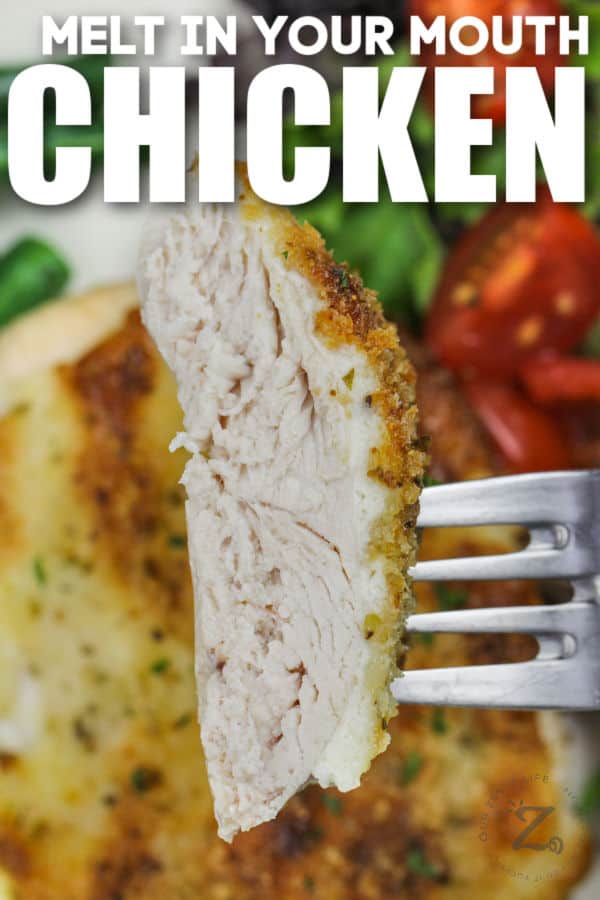 piece of Melt in Your Mouth Chicken on a fork with writing