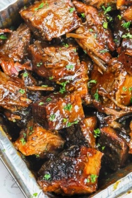 close up of cooked Burnt Ends with sauce
