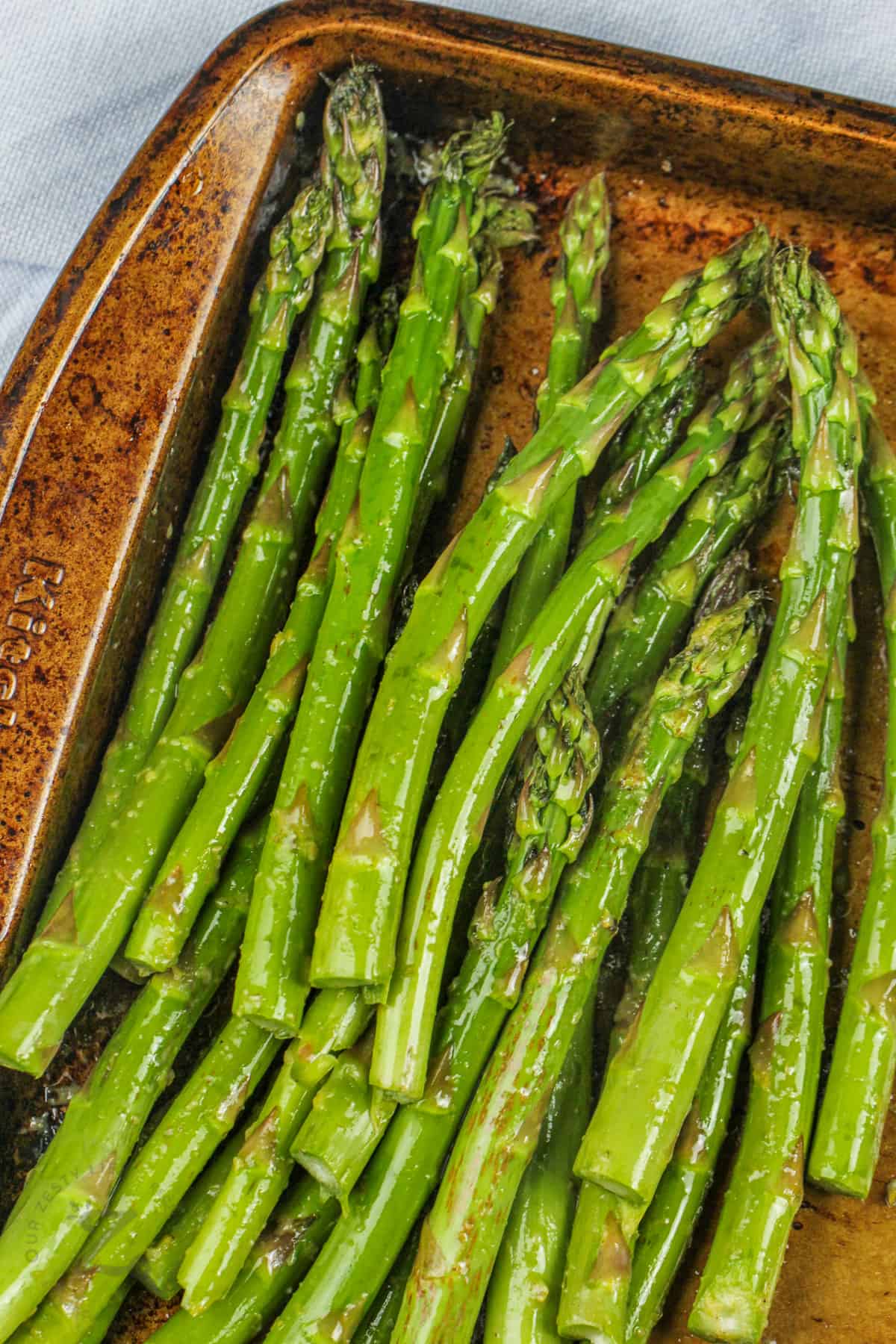 aspragus on a sheet pan to make Grilled Asparagus