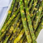 Grilled Asparagus on a plate with a lemon slice