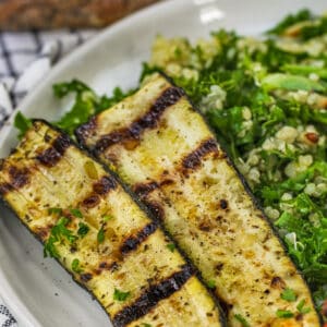 Grilled Zucchini with salad on a plate