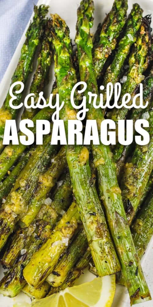 Grilled Asparagus with a lemon slice and writing