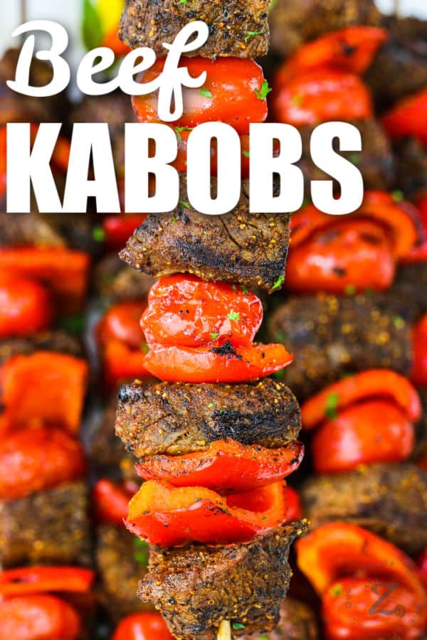 close up of Beef Kabobs with writing