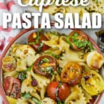 bowl of Caprese Pasta Salad with writing