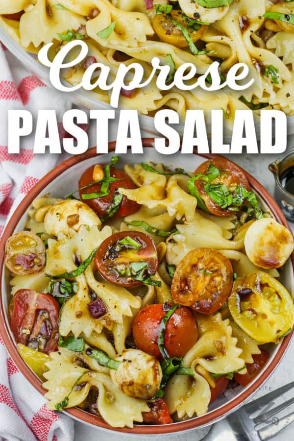 bowl of Caprese Pasta Salad with writing