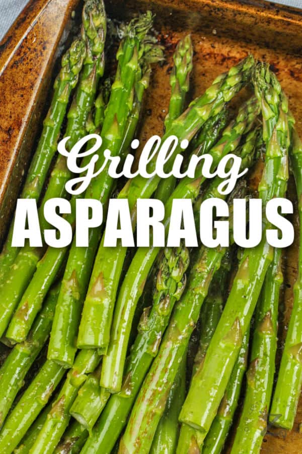 asparagus on a sheet pan to make Grilled Asparagus with a title