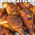 Smoked Chicken Drumsticks on a plate with writing