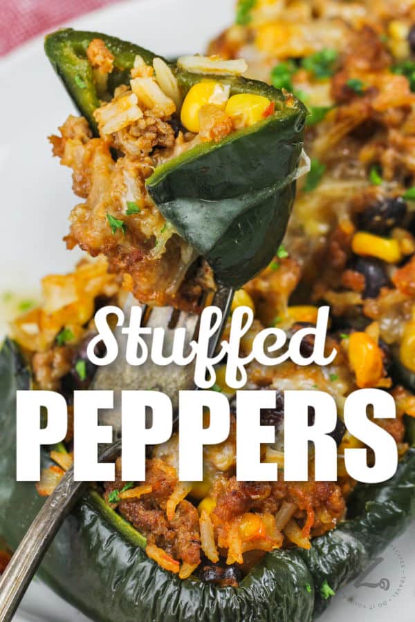 close up of plated Stuffed Poblano Peppers with a piece on a fork with a title