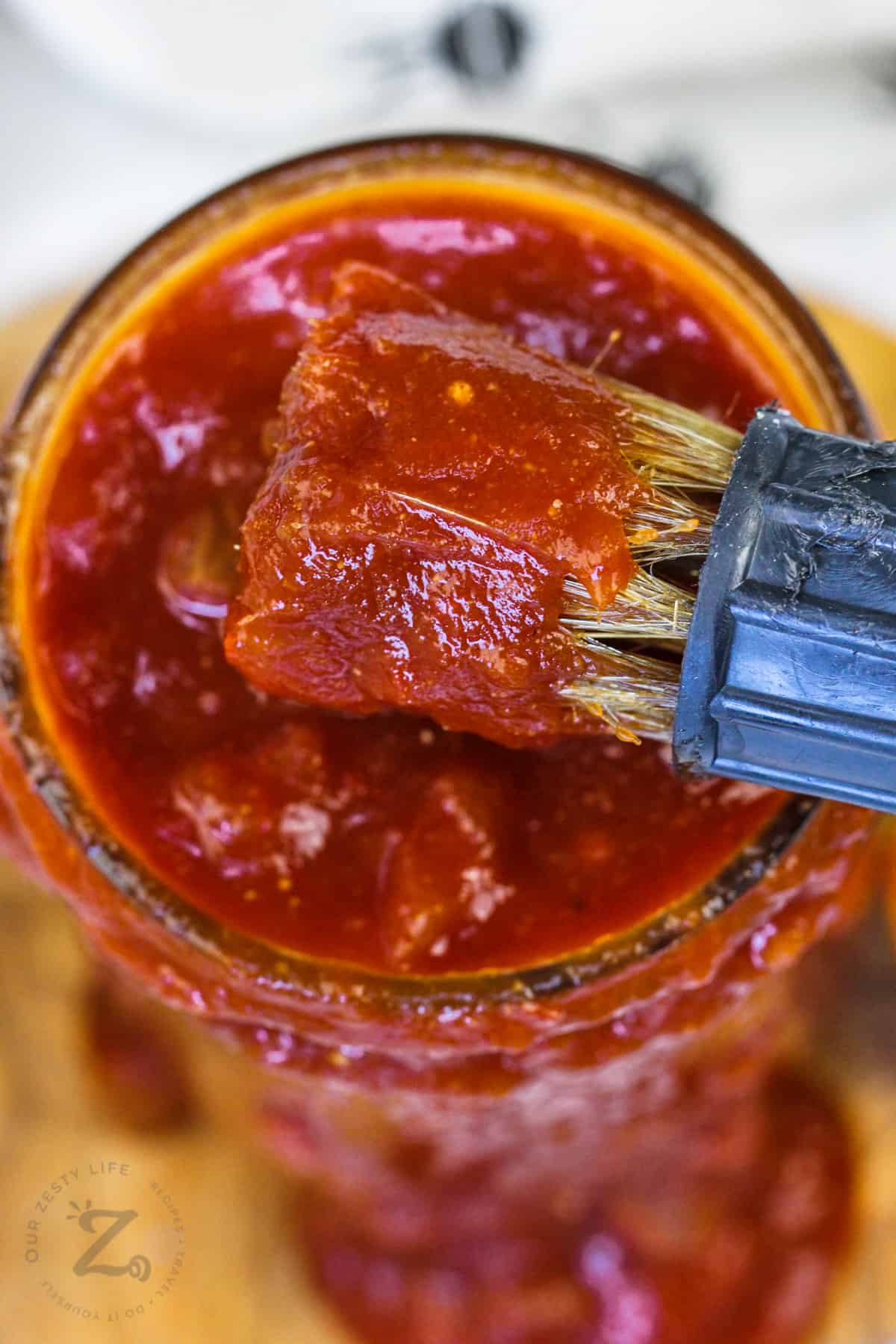 brush with Homemade Barbecue Sauce on it
