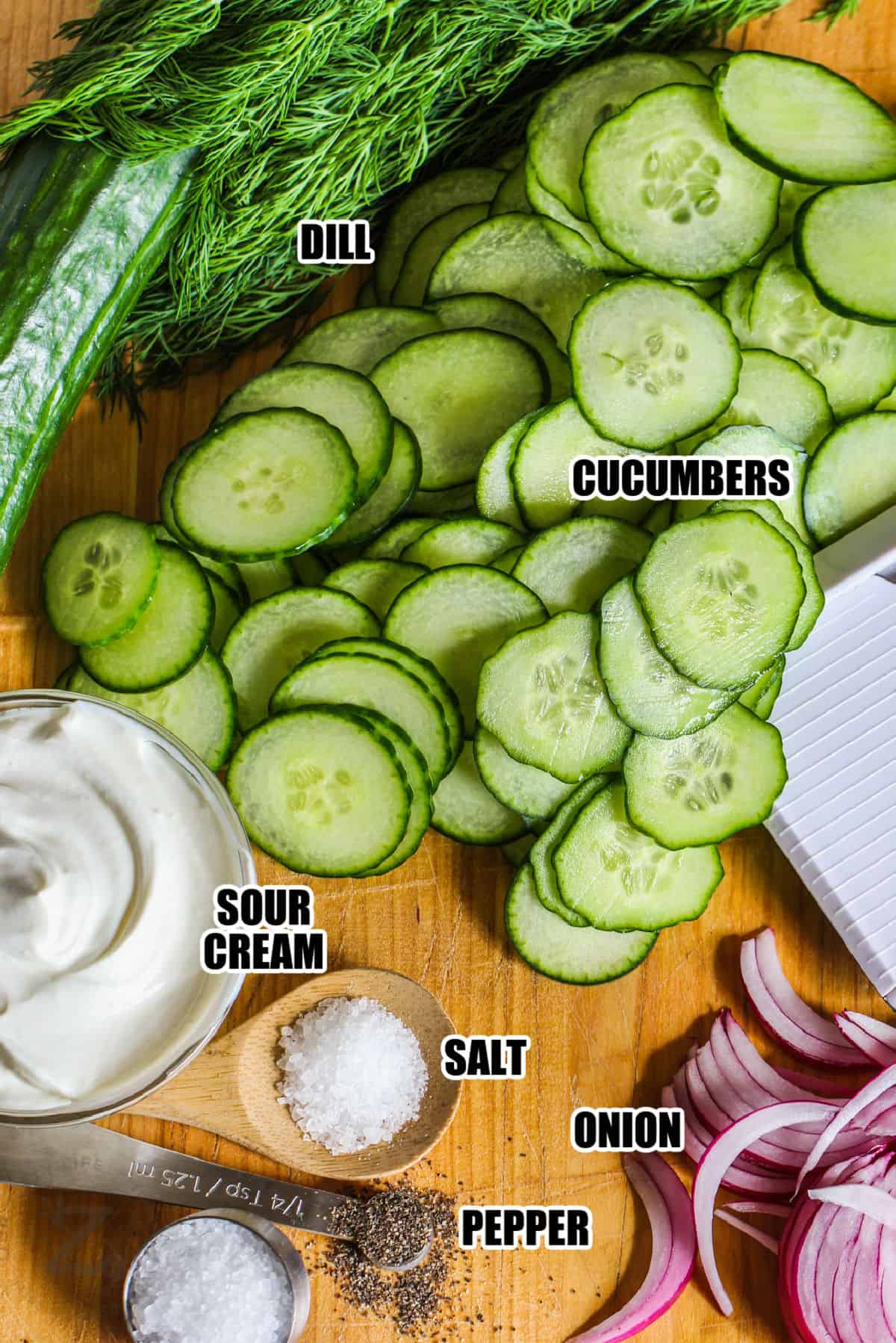 cucumbers , dill , sour cream, onion , salt and pepper to make Dill Cucumber Salad