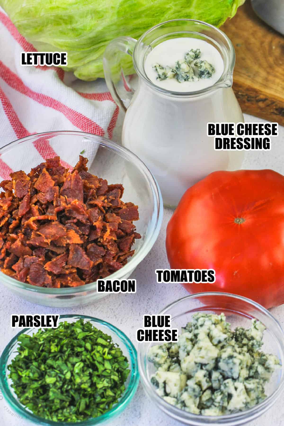 bacon , parsley , cheese , lettuce and tomatoes to make Wedge Salad
