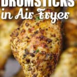 close up of Air Fryer Chicken Drumsticks with a title