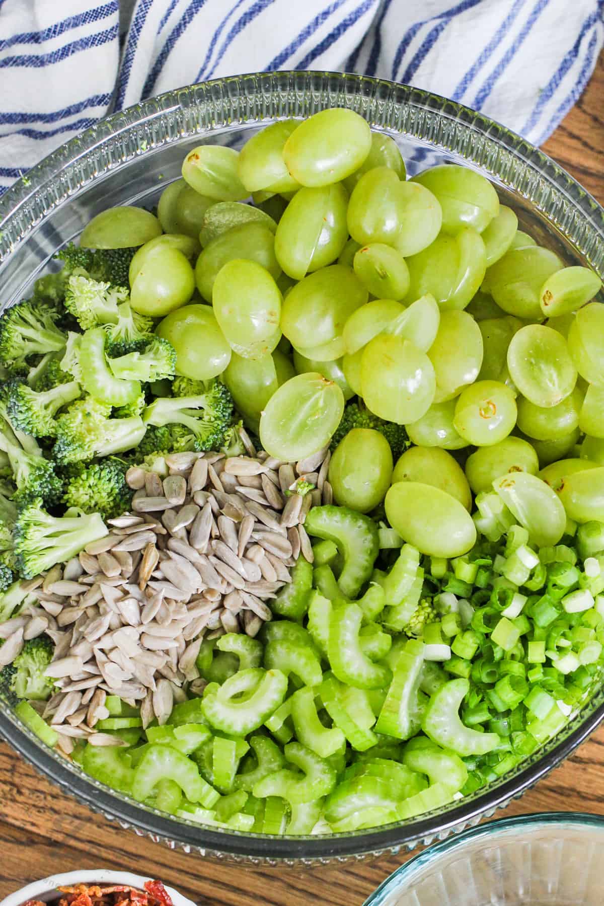 Broccoli Grape Salad ingredients in a bowl before mixing