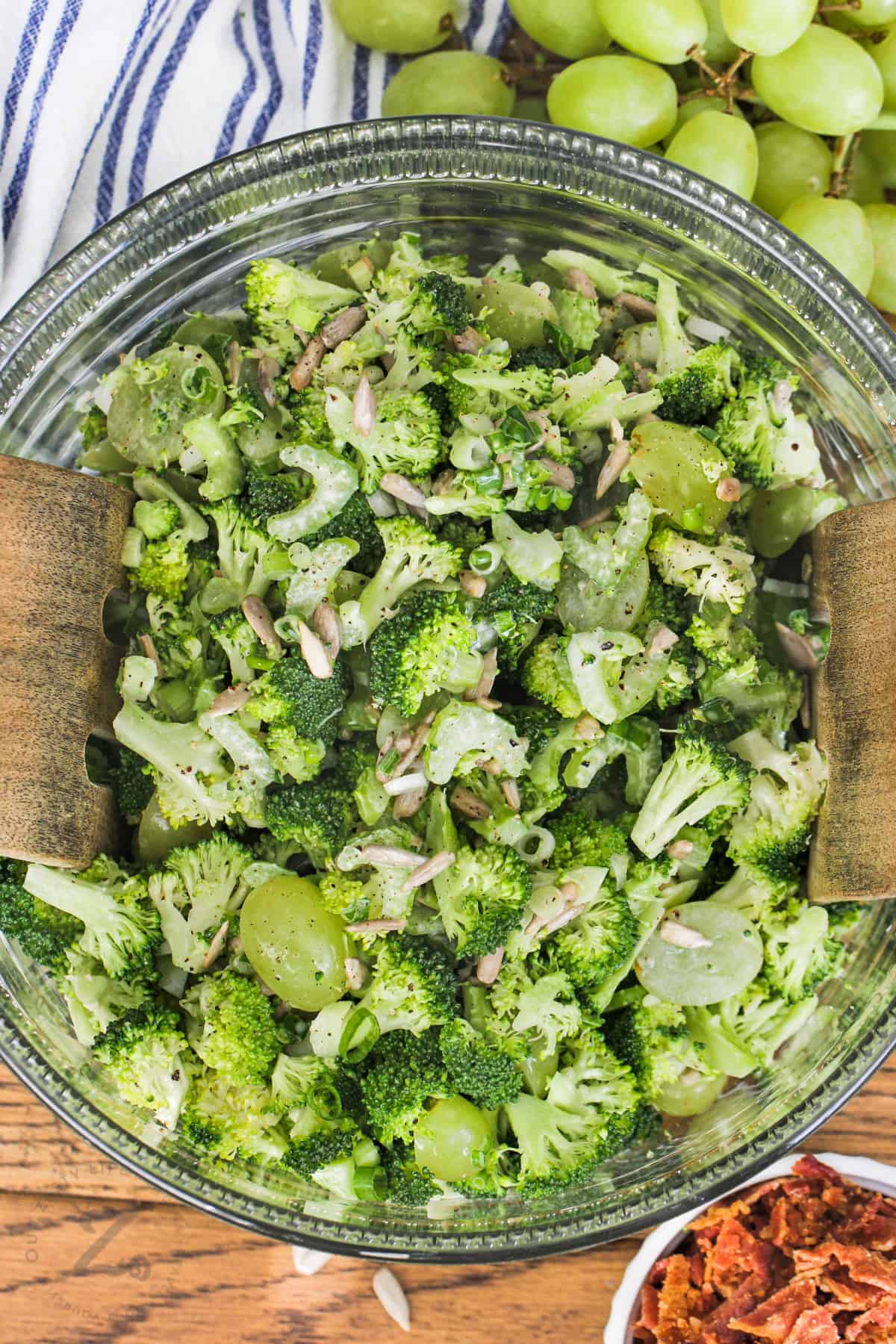 mixing ingredients to make Broccoli Grape Salad