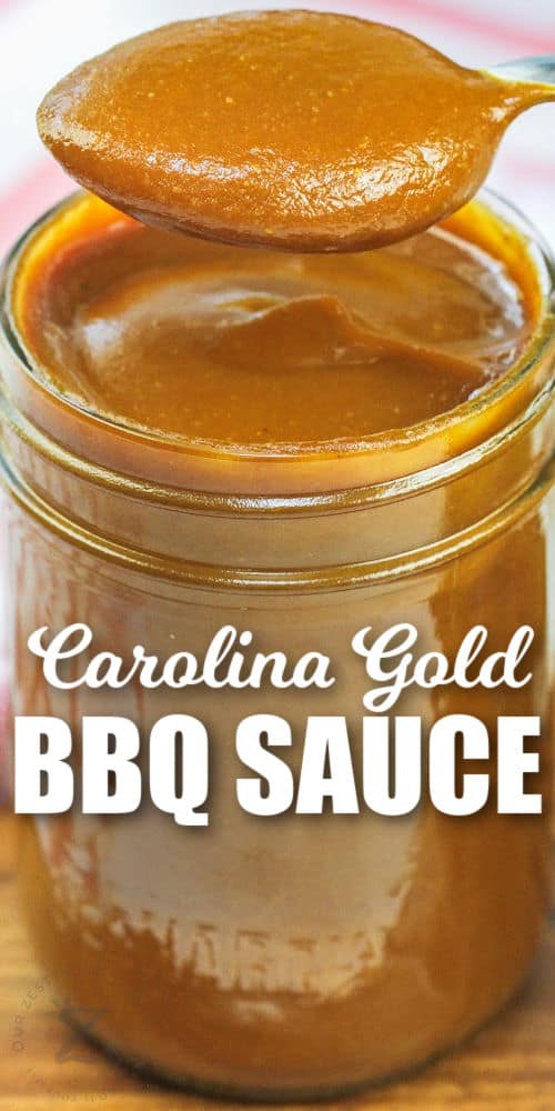 Carolina Gold BBQ Sauce being scooped out of a jar with a spoon with a title