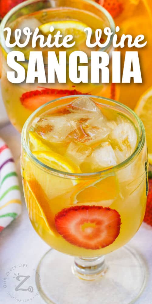 glasses of White Wine Sangria with ice and a title