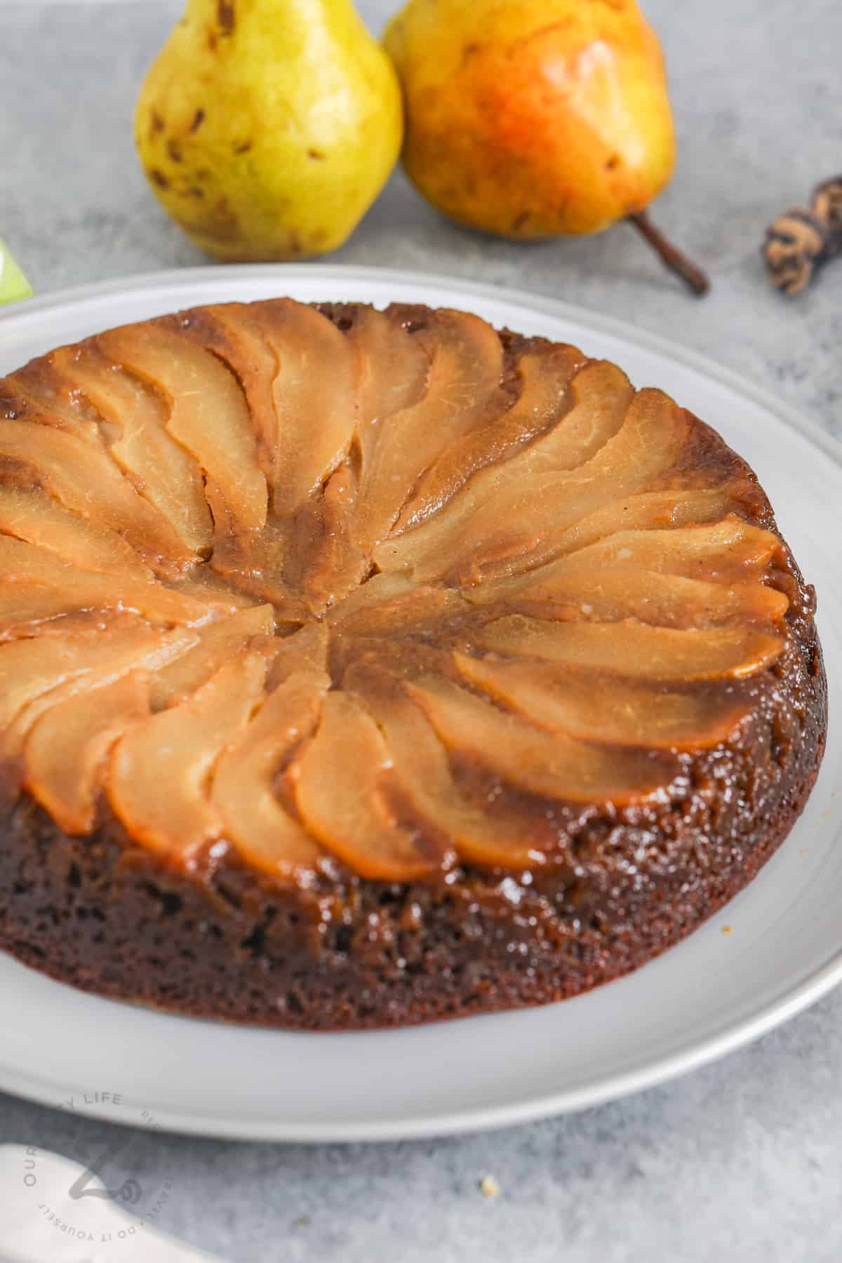 cooked Pear Upside Down Cake on a plate