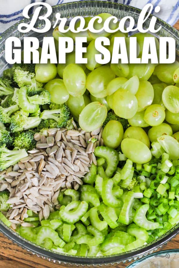 close up of Broccoli Grape Salad ingredients in a bowl with a title