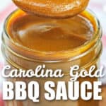 a scoop of Carolina Gold BBQ Sauce being taken from a jar with a title
