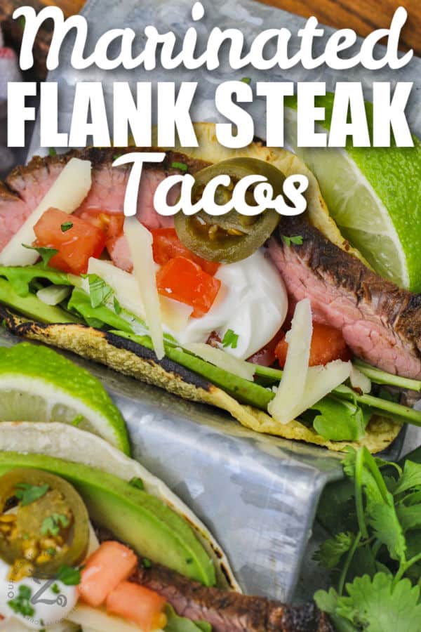 close up of Flank Steak Tacos with writing