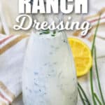 Homemade Ranch Dressing in a jar and on a wooden spoon with writing