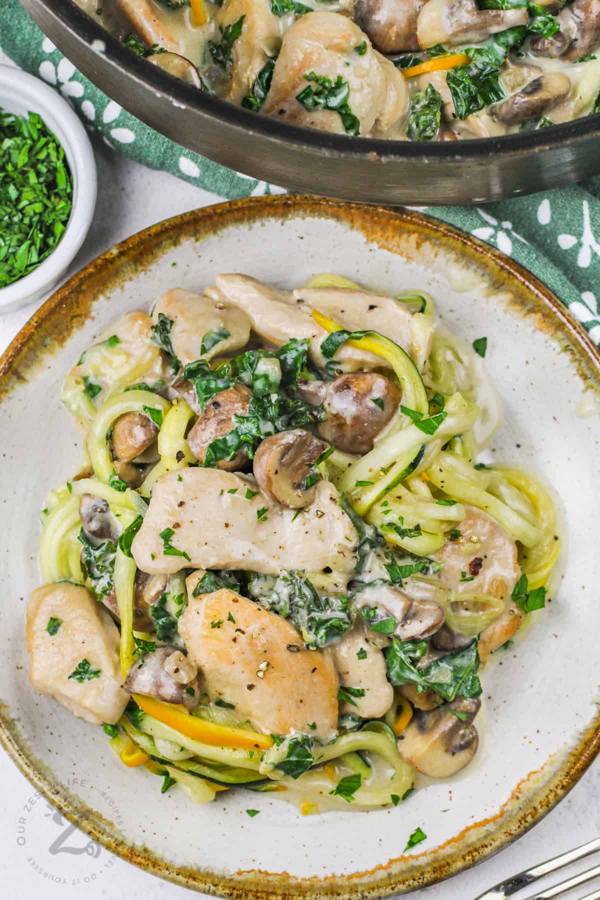 plated Creamy Chicken and Mushrooms with Kale