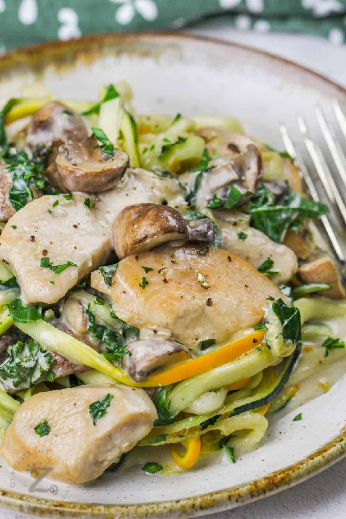 close up of Creamy Chicken and Mushrooms with Kale