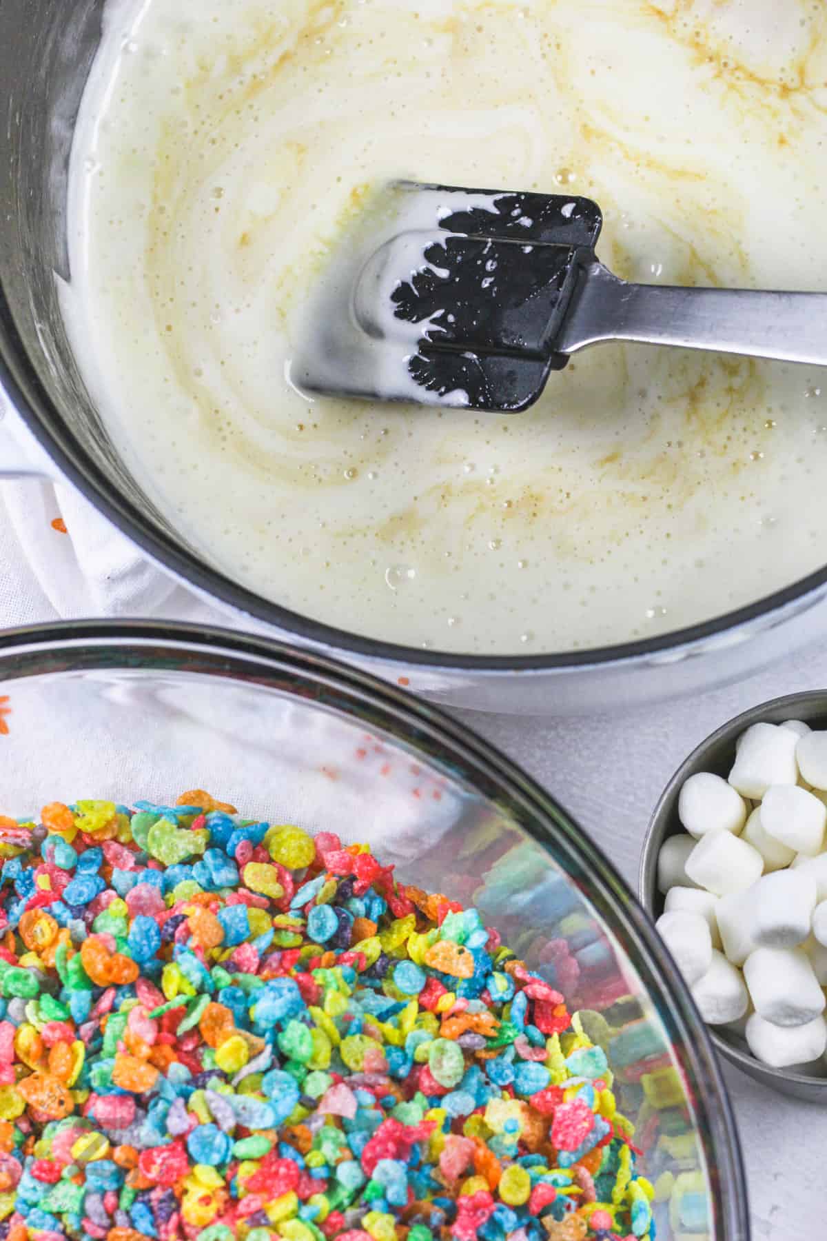 staring butter with vanilla to make Fruity Pebbles Marshmallow Treats
