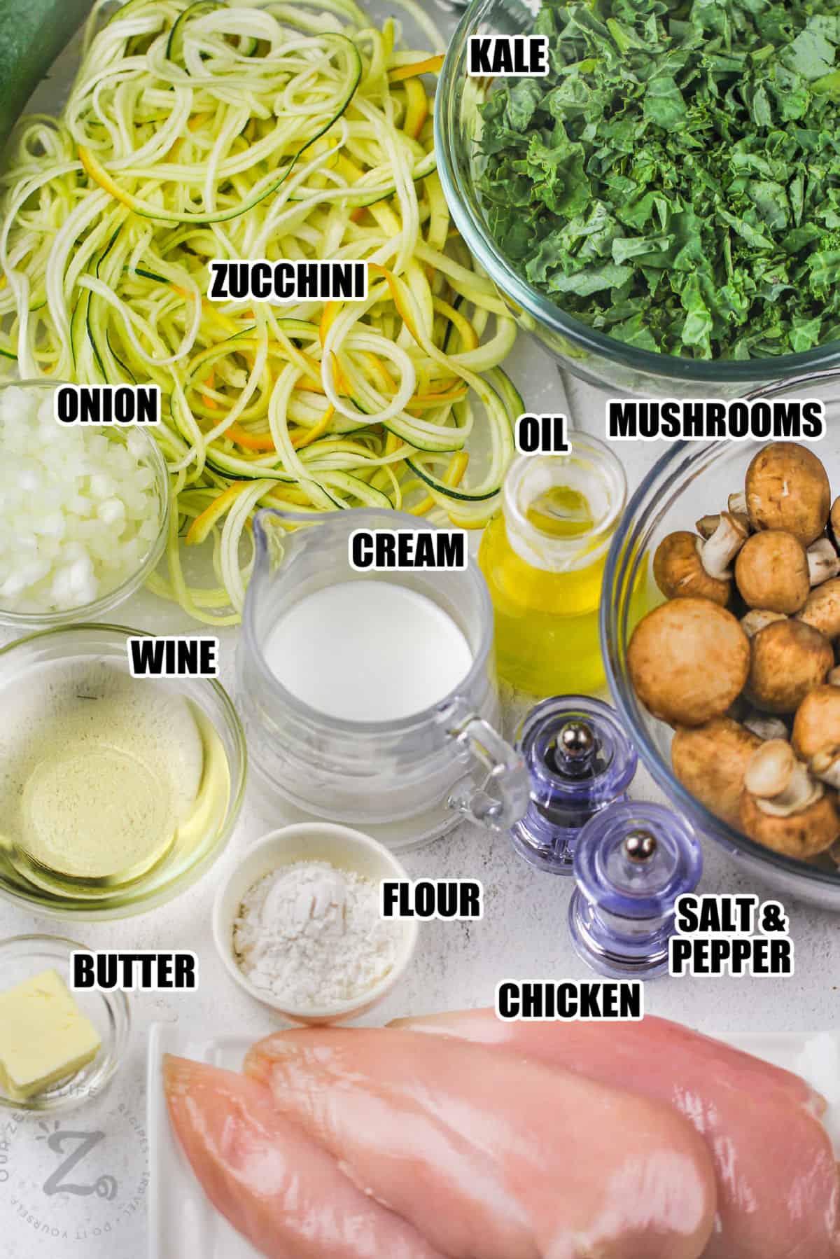 kale , zucchini , onion , cream , mushrooms , oil , wine , flour , butter , chicken and seasonings to make Creamy Chicken and Mushrooms with Kale with labels