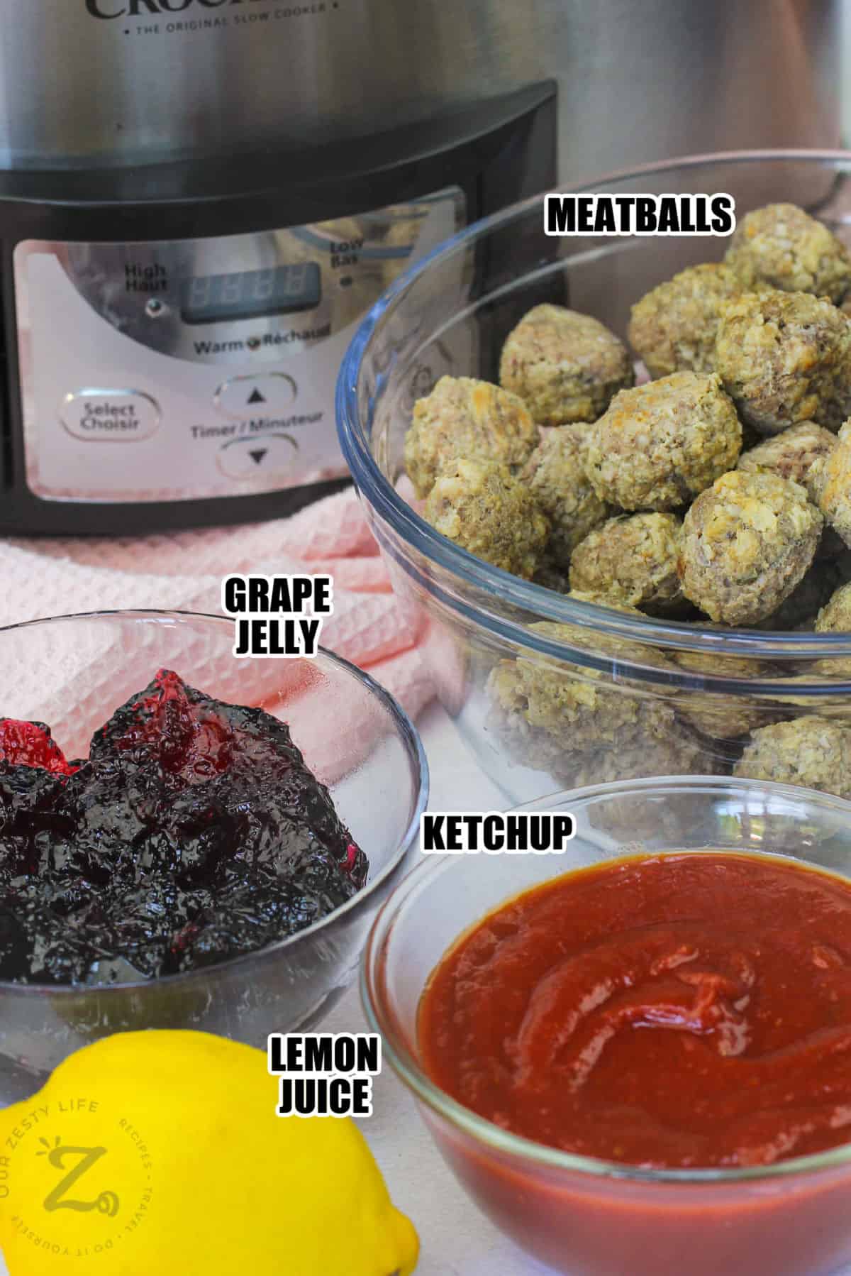 meatballs , grape jelly , ketchup and lemon to make Grape Jelly Meatballs