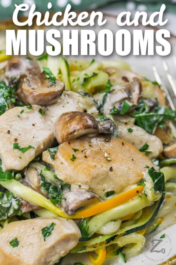 close up of Creamy Chicken and Mushrooms with Kale on a plate with writing