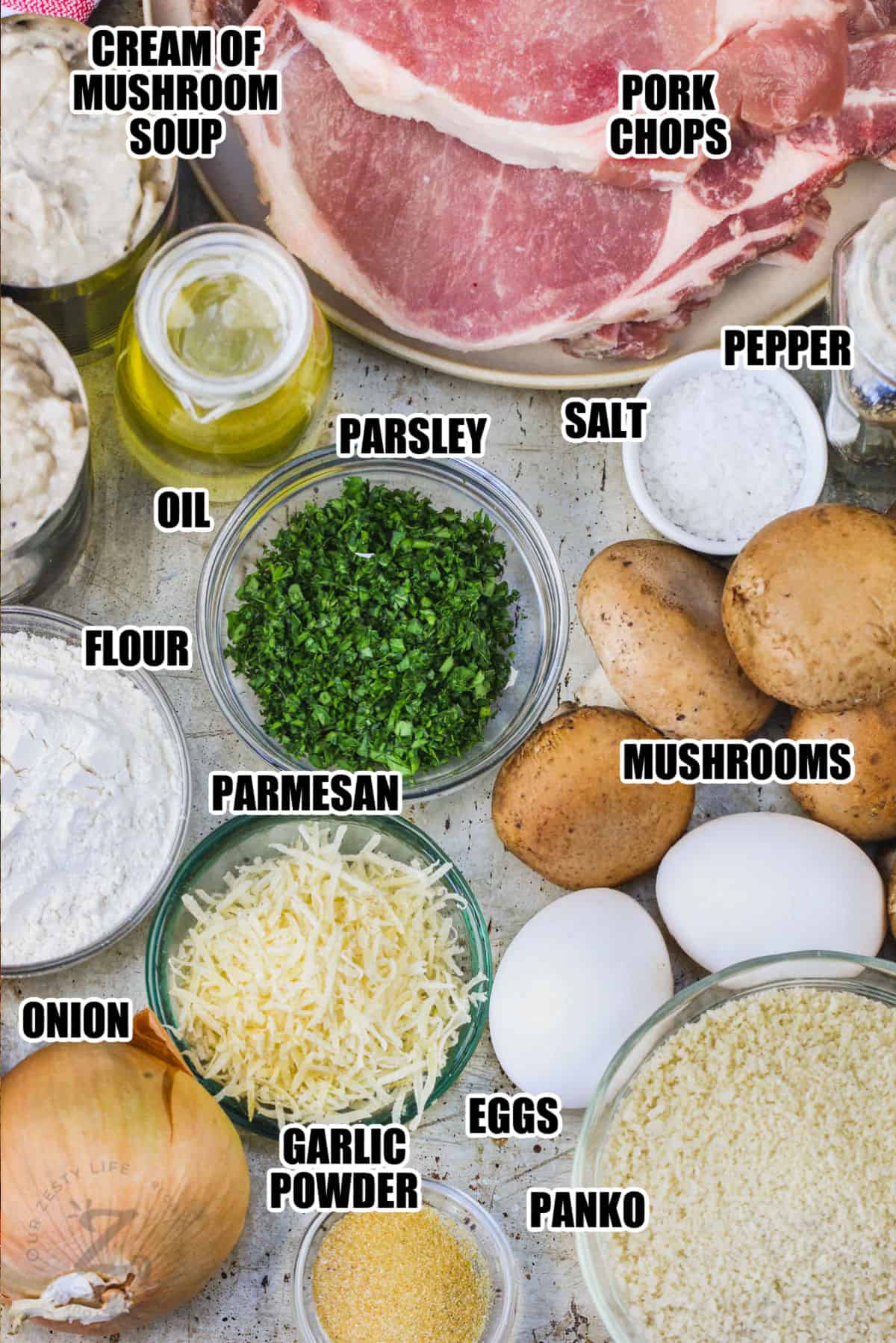 cream of mushroom soup , pork chops , mushrooms , parmesan , panko , eggs and seasonings to make Cream of Mushroom Pork Chops with labels