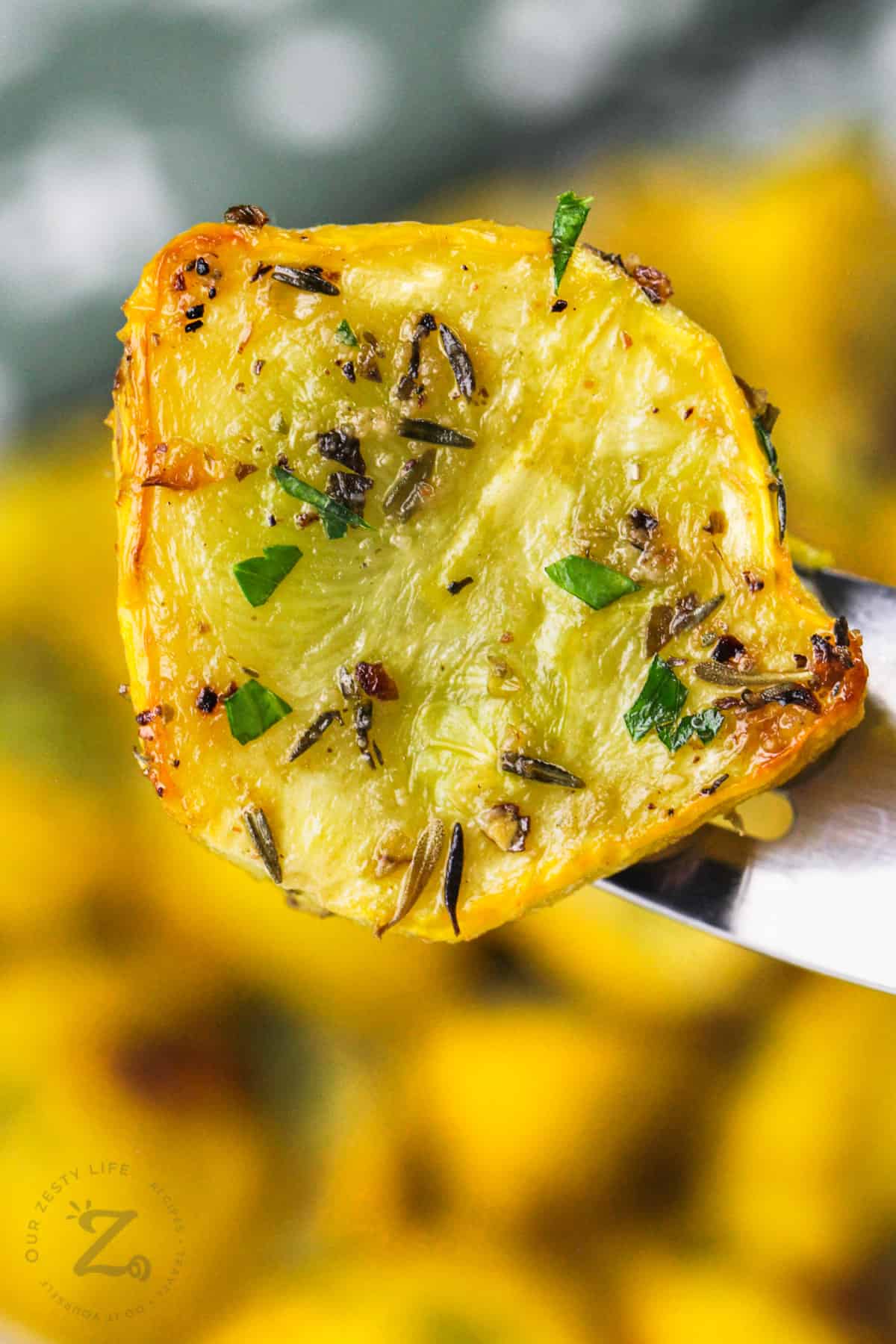 close up of Roasted Pattypan Squash on a fork