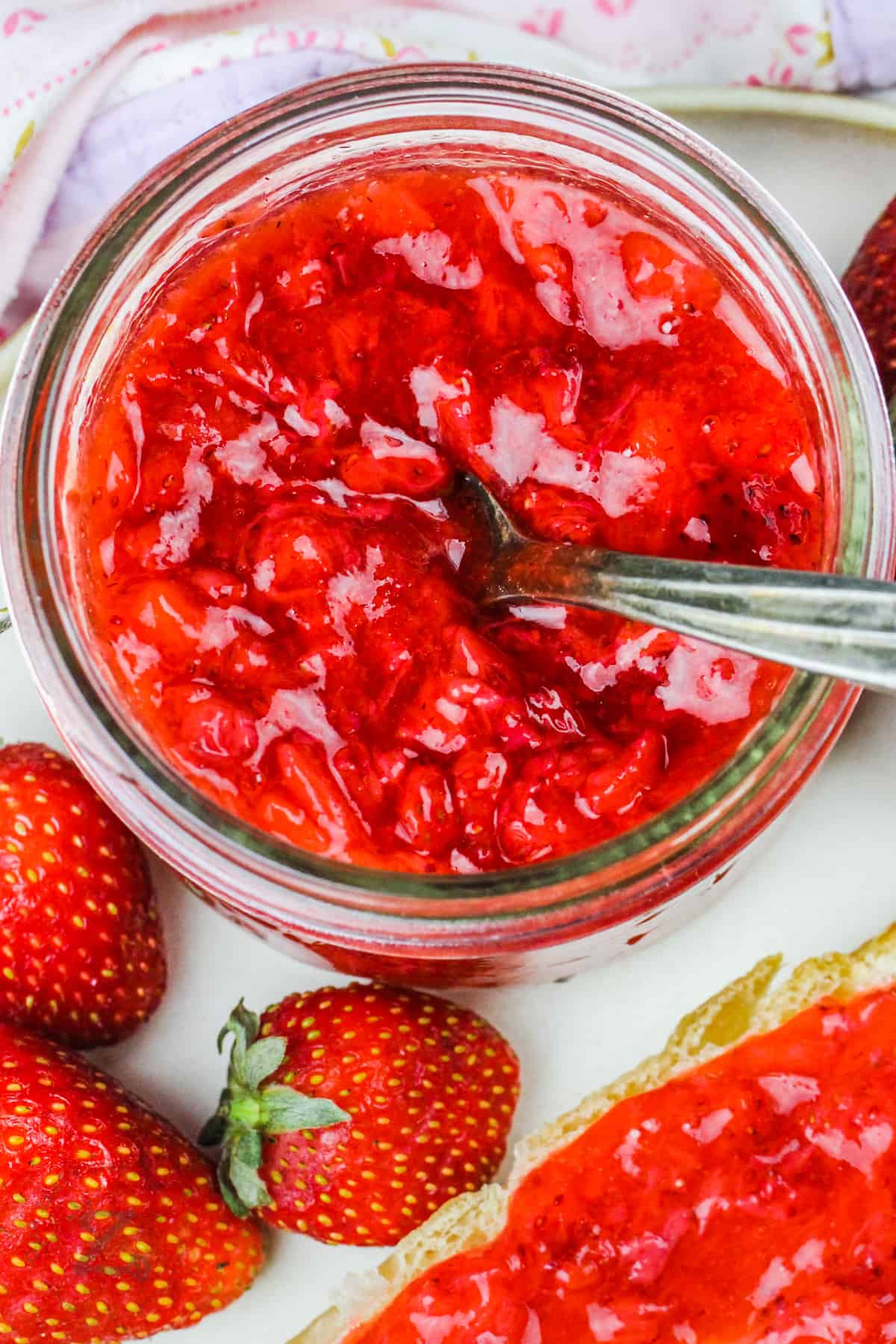 Sugar Free Strawberry Freezer Jam in a jar with a spoon