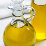 close up of Herb Infused Olive Oil in jars