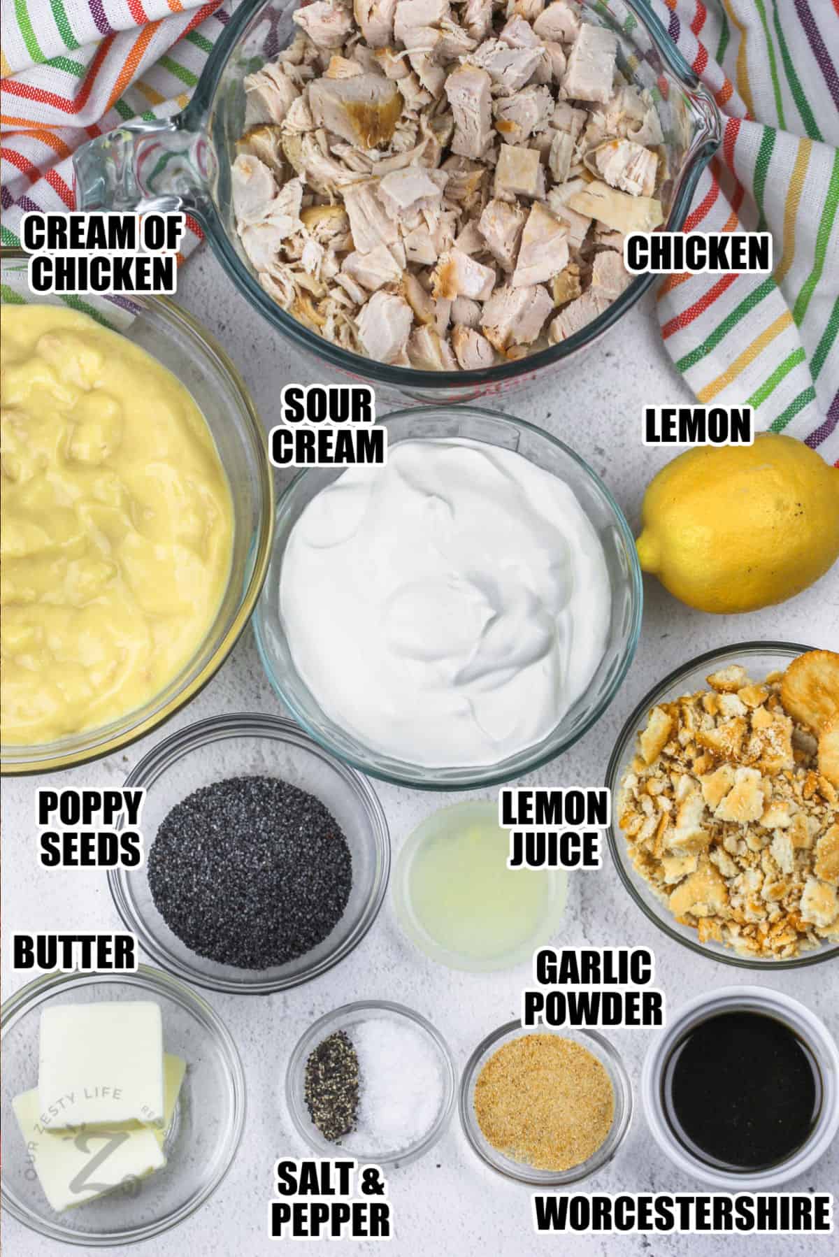 cream of chicken , sour cream . poppy seeds , butter , chicken , lemon , garlic powder , worcestershire and seasonings with labels to make Easy Poppyseed Chicken