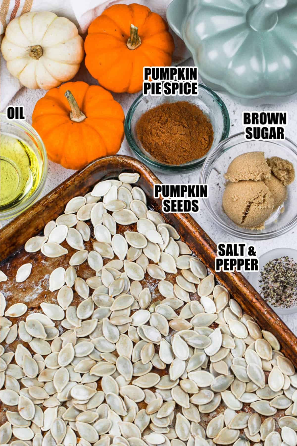 oil , pumpkin pie spice , pumpkin seeds , brown sugar , salt and pepper with labels to make Pumpkin Spice Pumpkin Seeds