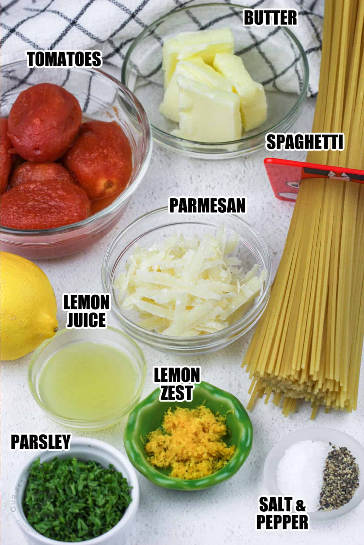 butter , tomatoes , parmesan , spaghetti , lemon juice , lemon zest , parsley and salt and pepper with labels to make Simple Tomato Lemon Pasta